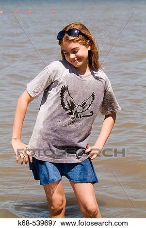 Stock Photo - girl, 10, at beach. Fotosearch