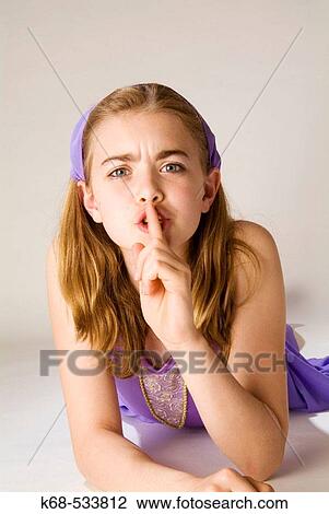 girl, 10, hush signal View Large Photo Image Stock Image - girl, 10, hush signal. Fotosearch