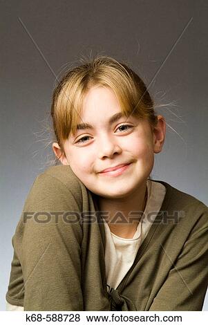 Girl, 10, studio photo View Large Photo Image Stock Photo - Girl, 10, studio photo. Fotosearch