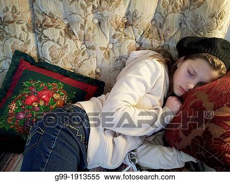 Girl, 11 years old, sleeping on couch, Sault Ste Marie, Ontario, Canada View Large Photo Image Stock Photography - Girl, 11 years old, sleeping on couch, Sault Ste Marie, Ontario, Canada. Fotosearch