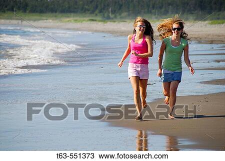 girl 13, girl 18 yrs running on beach View Large Photo Image Stock Image - girl 13, girl 18 yrs running on beach. Fotosearch
