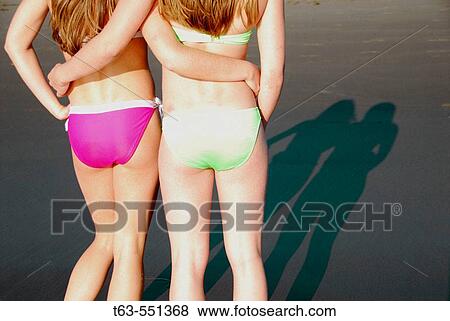 girl 13, girl 18 yrs standing together on beach View Large Photo Image Stock Photo - girl 13, girl 18 yrs standing together on beach. Fotosearch