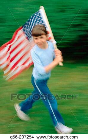 Girl (8 yrs) running with USA flag View Large Photo Image Picture - Girl (8 yrs) running with USA flag. Fotosearch