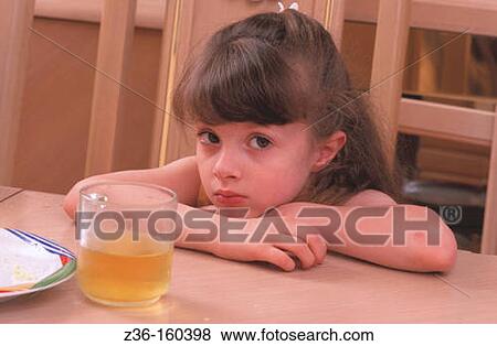 Girl after meal View Large Photo Image Stock Photo - Girl after meal. Fotosearch