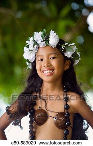 Stock Photo - Girl (age 9) in Poynesian. Dance Outfit, Palau, Micronesia, Rock Islands, World Heritage Site, Western Pacific. Fotosearch