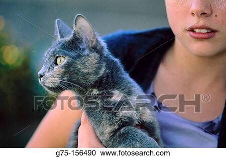 Stock Image - Girl and cat. Fotosearch