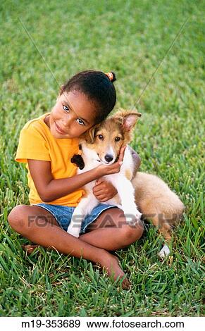Girl and puppy View Large Photo Image Stock Photo - Girl and puppy. Fotosearch