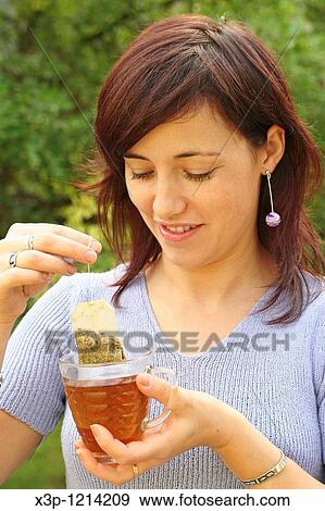 Girl and tea View Large Photo Image Stock Photo - Girl and tea. Fotosearch