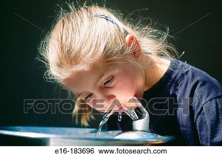 Girl at drinking fountain View Large Photo Image Stock Photograph - Girl at drinking fountain. Fotosearch