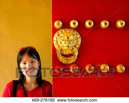 Girl at gate Door. The Temple of Heaven. Beijing. People's Republic of China View Large Photo Image Stock Image - Girl at gate Door. The Temple of Heaven. Beijing. People's Republic of China. Fotosearch