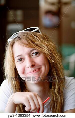 Picture - Girl at sunset outdoors. Fotosearch