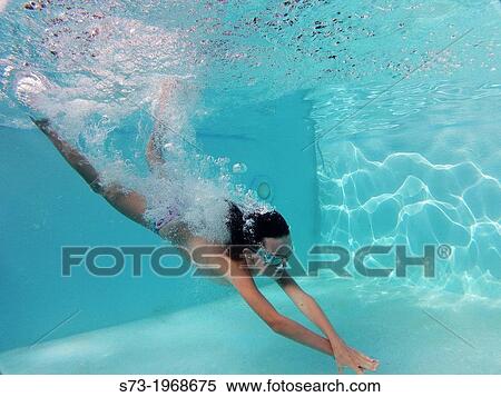 Girl being underwater View Large Photo Image Stock Photography - Girl being underwater. Fotosearch