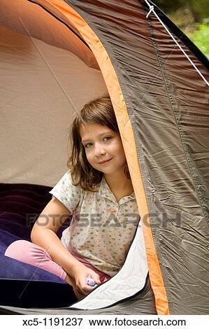 Girl camping, summer time, Montseny Natural Park, Barcelona, Catalonia, Spain View Large Photo Image Stock Photo - Girl camping, summer time, Montseny Natural Park, Barcelona, Catalonia, Spain. Fotosearch