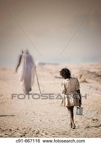 Girl carrying milk pot, Allahabad. Uttar Pradesh, India View Large Photo Image Stock Photograph - Girl carrying milk pot, Allahabad. Uttar Pradesh, India. Fotosearch
