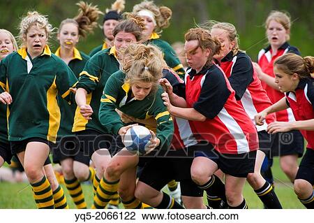 girl catching ball in rugby game, Canada, Ontario View Large Photo Image Stock Image - girl catching ball in rugby game, Canada, Ontario. Fotosearch