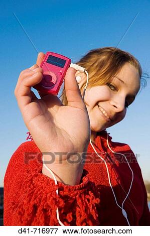 girl child in red hood listening to mp3 player View Large Photo Image Stock Photo - girl child in red hood listening to mp3 player. Fotosearch