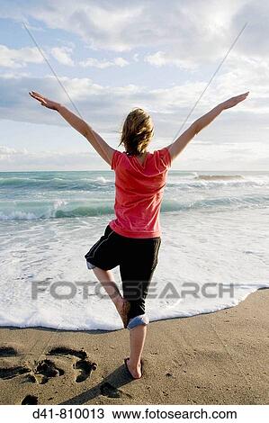 Stock Image - girl child on beach 13 year old portrait. Fotosearch