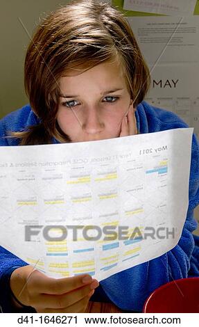 girl child reading exam timetable View Large Photo Image Stock Image - girl child reading exam timetable. Fotosearch