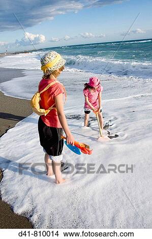 girl children on beach 2 sisters View Large Photo Image Picture - girl children on beach 2 sisters. Fotosearch
