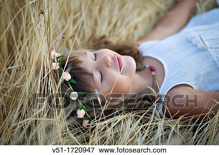 girl, countryside, laying, resting, eyes shut View Large Photo Image Stock Photo - girl, countryside, laying, resting, eyes shut. Fotosearch