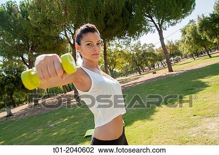 girl doing sports in a park. View Large Photo Image Stock Image - girl doing sports in a park.. Fotosearch