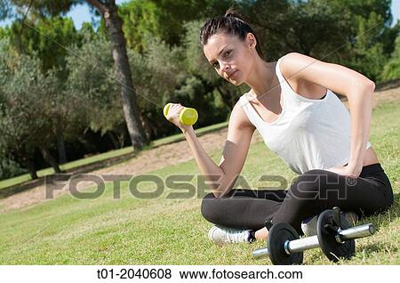 girl doing sports in a park. View Large Photo Image Stock Photo - girl doing sports in a park.. Fotosearch