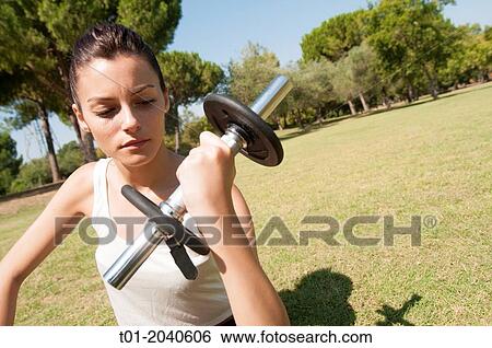 girl doing sports in a park. View Large Photo Image Stock Photograph - girl doing sports in a park.. Fotosearch