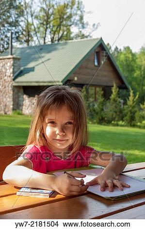 Girl drawing with crayons. View Large Photo Image Picture - Girl drawing with crayons.. Fotosearch