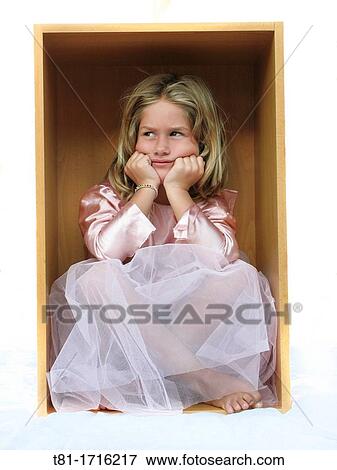 Girl dressed in box View Large Photo Image Stock Photo - Girl dressed in box. Fotosearch