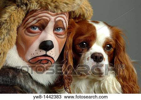 Girl dressed like her dog, King Charles Cavalier View Large Photo Image Stock Image - Girl dressed like her dog, King Charles Cavalier. Fotosearch