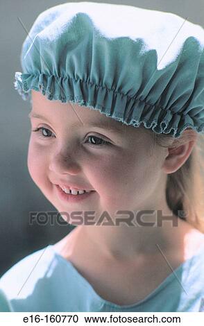 Girl dressed up in surgeon outfit View Large Photo Image Stock Image - Girl dressed up in surgeon outfit. Fotosearch