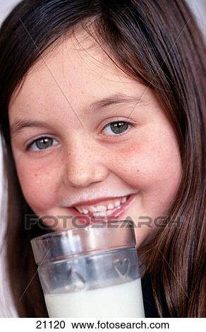 Girl drinking milk View Large Photo Image Stock Image - Girl drinking milk. Fotosearch