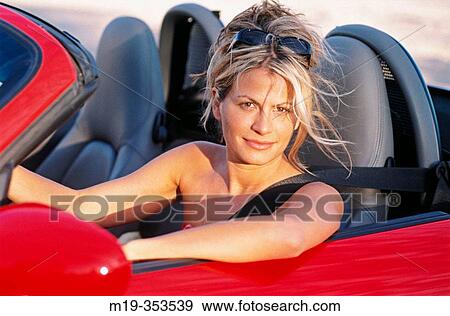 girl driving a convertible View Large Photo Image Stock Photo - girl driving a convertible. Fotosearch