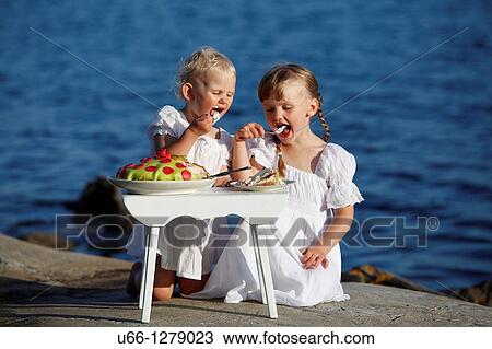 Girl eating cake N? velso Sm? land Sweden. View Large Photo Image Stock Image - Girl eating cake N? velso Sm? land Sweden.. Fotosearch