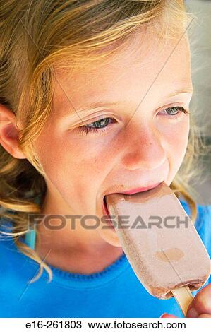 Girl eating ice-cream View Large Photo Image Stock Image - Girl eating ice-cream. Fotosearch