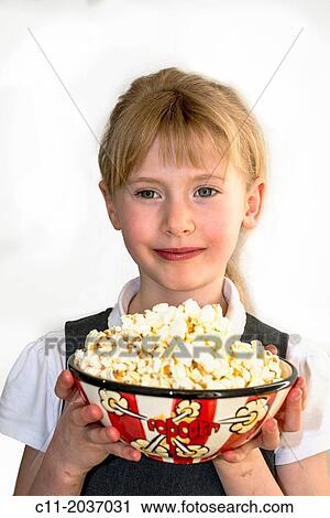 girl eating popcorn View Large Photo Image Stock Image - girl eating popcorn. Fotosearch