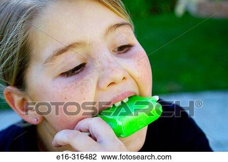 girl eating popsicle View Large Photo Image Stock Image - girl eating popsicle. Fotosearch