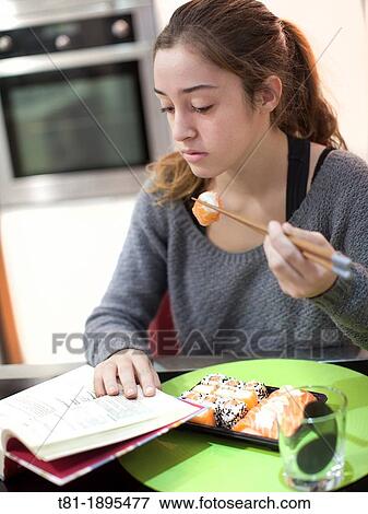 girl eating sushi View Large Photo Image Stock Photo - girl eating sushi. Fotosearch