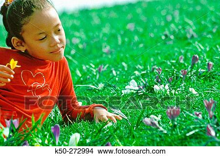 Girl enjoying Spring Flowers, The Netherlands View Large Photo Image Picture - Girl enjoying Spring Flowers, The Netherlands. Fotosearch