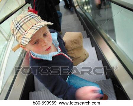 Girl, escalator. Hamburg. Germany View Large Photo Image Stock Photo - Girl, escalator. Hamburg. Germany. Fotosearch