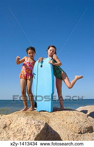 Girl friends hamming it up at the beach, Paines Beach, Cape Cod MA View Large Photo Image Picture - Girl friends hamming it up at the beach, Paines Beach, Cape Cod MA. Fotosearch