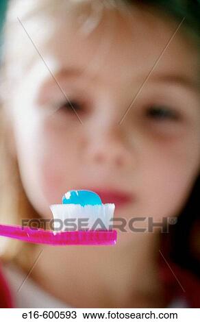 Girl getting ready to brush teeth View Large Photo Image Stock Image - Girl getting ready to brush teeth. Fotosearch
