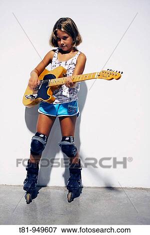 Stock Photo - girl guitarist. Fotosearch