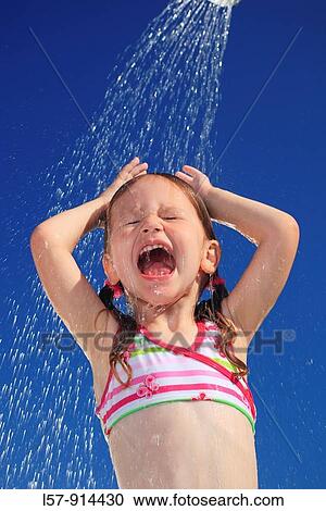girl having shower outdoors, Switzerland View Large Photo Image Stock Image - girl having shower outdoors, Switzerland. Fotosearch