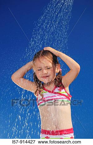 girl having shower outdoors, Switzerland View Large Photo Image Stock Photo - girl having shower outdoors, Switzerland. Fotosearch