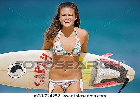 Girl holding surf board, Oahu, Hawaii, USA View Large Photo Image Stock Image - Girl holding surf board, Oahu, Hawaii, USA. Fotosearch