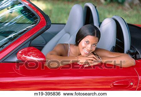 girl in a convertible View Large Photo Image Stock Photograph - girl in a convertible. Fotosearch