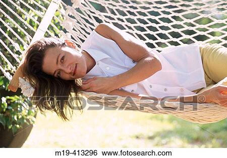 girl in a hammock View Large Photo Image Stock Photograph - girl in a hammock. Fotosearch