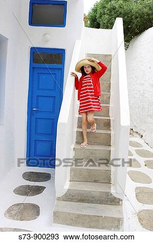 Girl in a Mykonos house, Mykonos, Cyclades, Greece, Europe View Large Photo Image Stock Image - Girl in a Mykonos house, Mykonos, Cyclades, Greece, Europe. Fotosearch