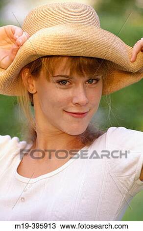 girl in a straw hat View Large Photo Image Stock Image - girl in a straw hat. Fotosearch